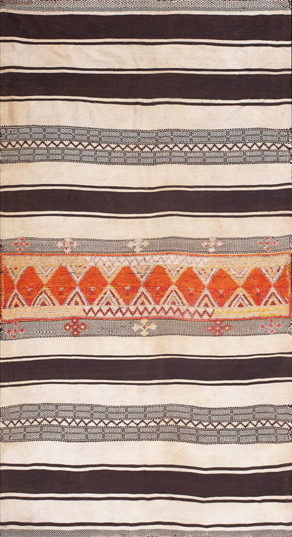 A flat-woven rug with cream and dark brown horizontal stripes, featuring a central band of bright orange geometric diamond patterns.