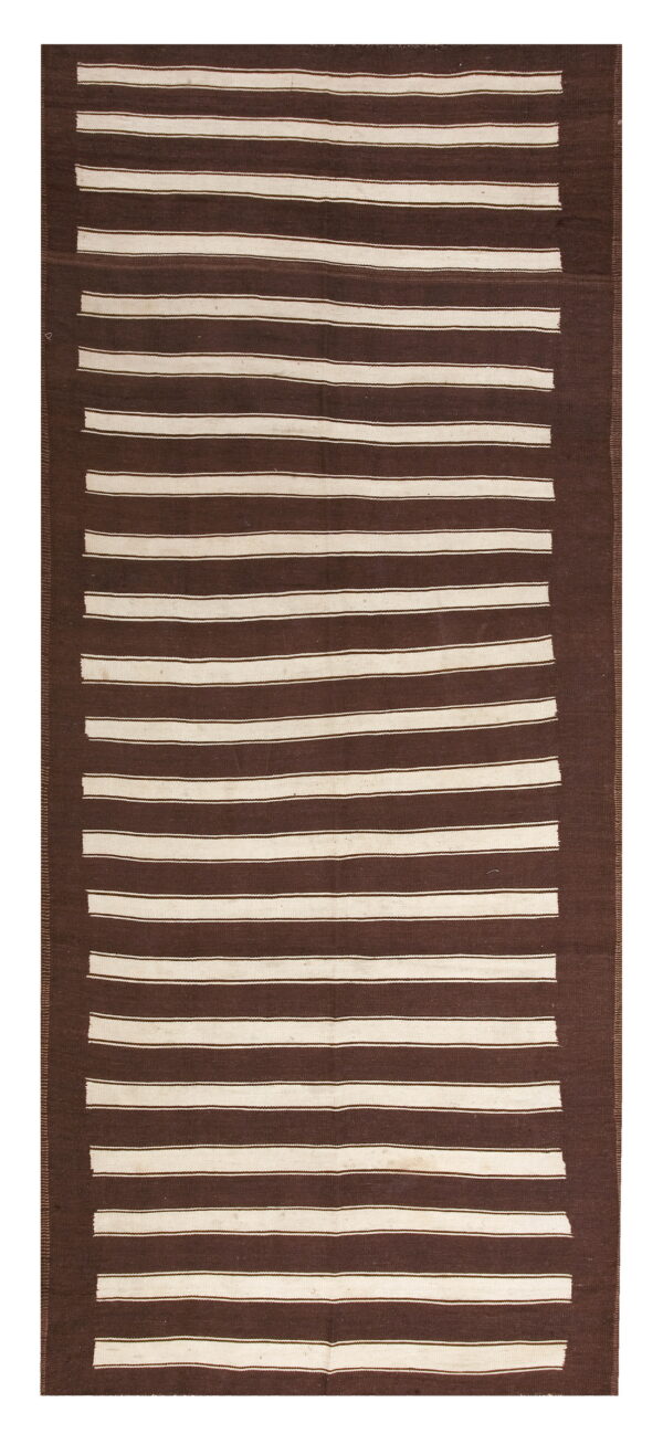Dark brown and cream striped flatweave rug with solid brown edges.