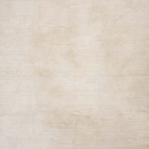 Solid cream and beige rug showing horizontal striated texture across the low pile surface.