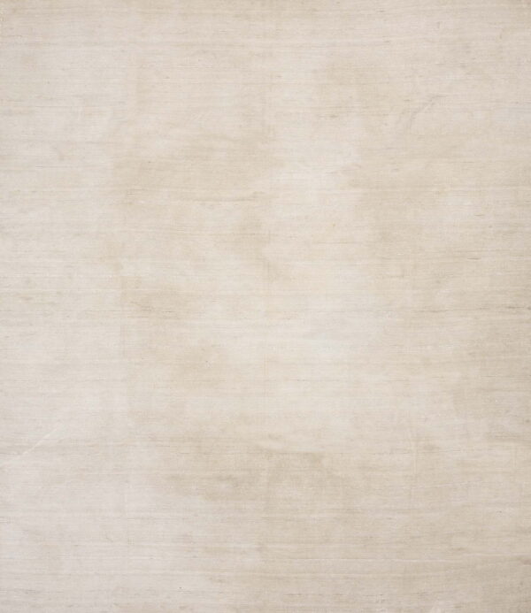 Solid cream and beige rug showing horizontal striated texture across the low pile surface.