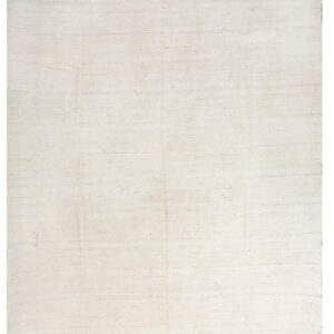 Solid cream flatweave rug displaying subtle horizontal lines and low texture.
