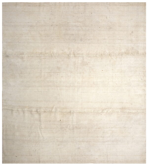 Plain off-white flatwoven rug featuring subtle tonal texture and horizontal stitched seams across the width.