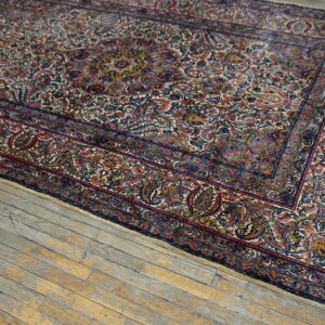Colorful intricate Persian knotted rug