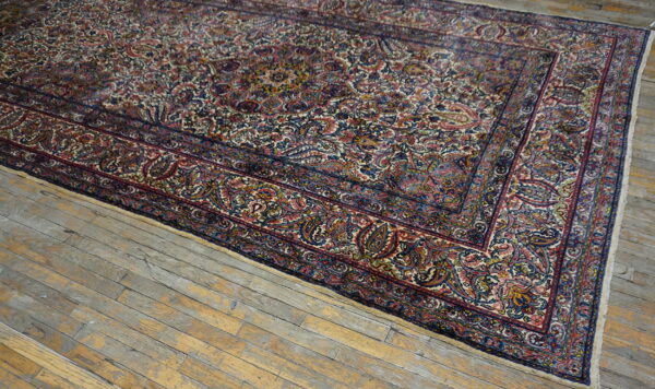 Colorful intricate persian knotted rug