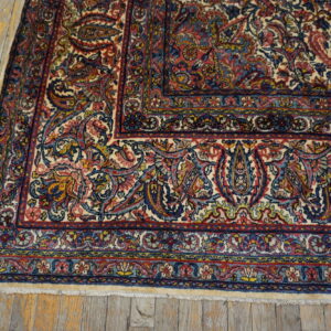 Intricate floral patterns on vintage rug