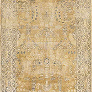 Narrow runner rug featuring distressed golden yellow and beige traditional floral designs.