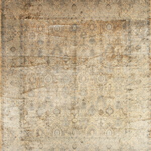 Distressed traditional rug in muted beige and blue/grey features an intricate, faded design.