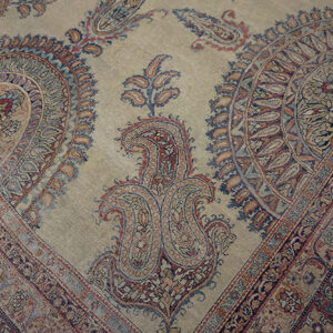 Intricate floral patterns on ivory background