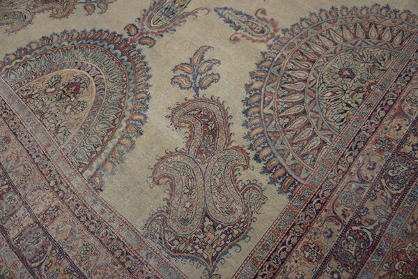 Intricate floral patterns on ivory background