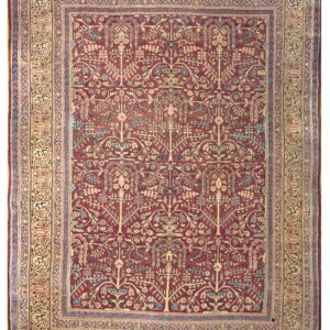 Low-pile area rug featuring a dense red botanical pattern and complex tan and blue borders with script elements.