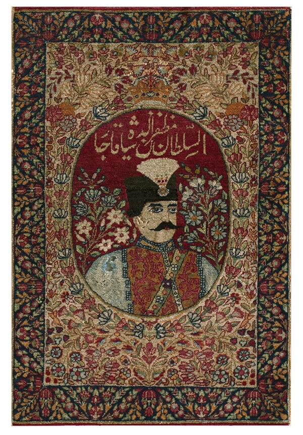 Highly detailed rug displaying a portrait in a deep red oval, framed by dense floral patterns and dark borders.