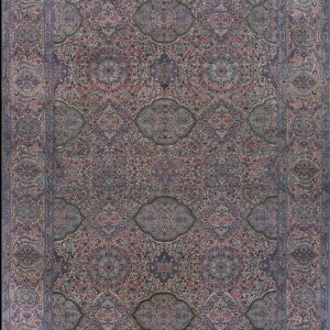 Intricate traditional rug with dense repeating medallions and floral patterns in blue, red, and cream.