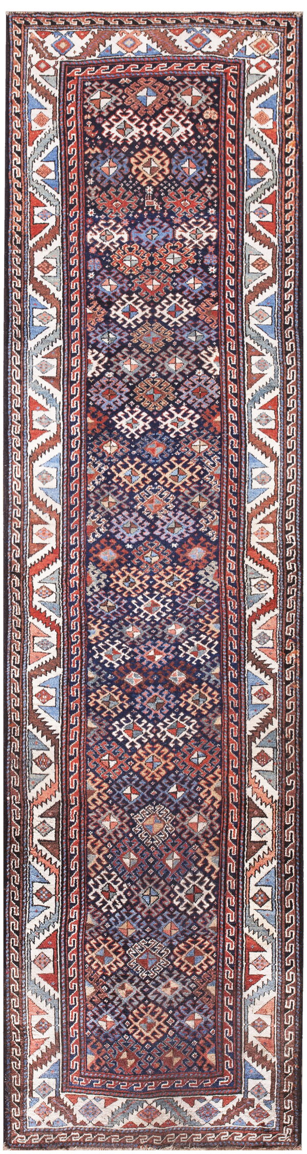 Geometric runner with a dark blue center field and a busy border of red, white, and blue stepped triangles.