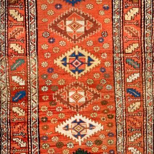 Colorful geometric patterned antique rug