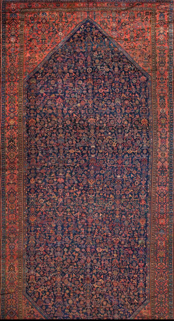 Intricate blue and red patterned rug