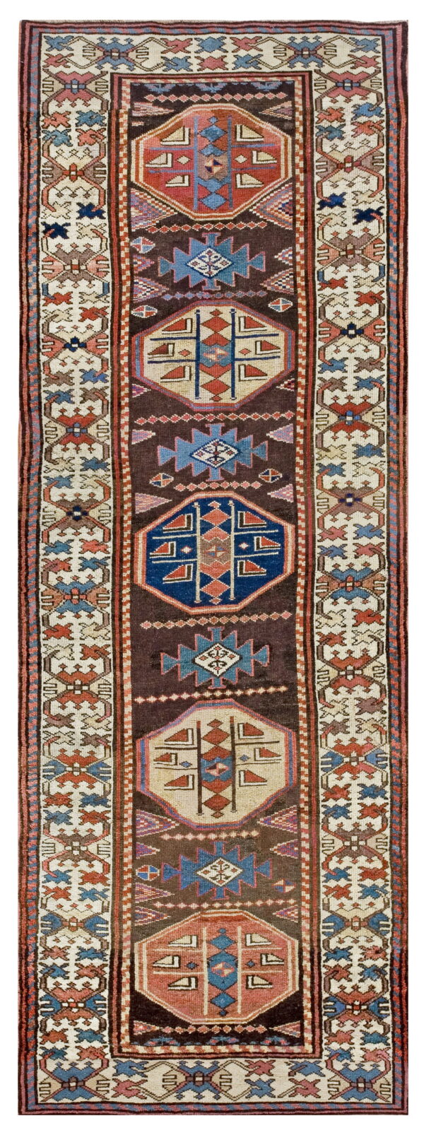 Traditional runner with a dark brown field, large central geometric medallions, and a cream tribal patterned border.