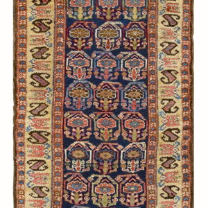 Geometric navy blue runner rug with repeating gabled motifs and a wide cream and red border.