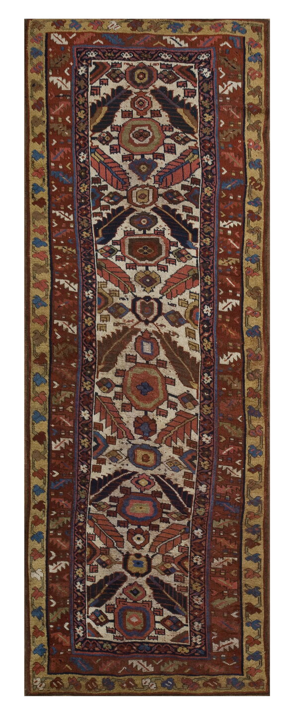 Narrow runner rug with a cream field, vertical tribal medallions, and wide borders in rust and gold.