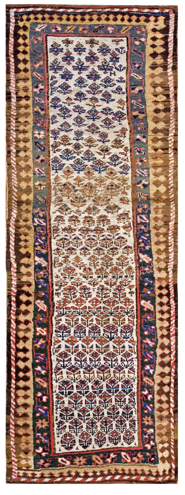 A long, narrow runner rug with a cream field, stylized red and blue tree motifs, and thick brown geometric borders.
