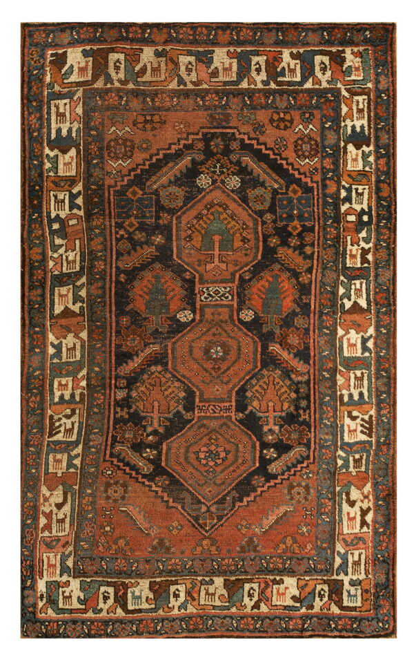 Rust and navy geometric rug with a central axis design and an elaborate border featuring stylized animal figures.