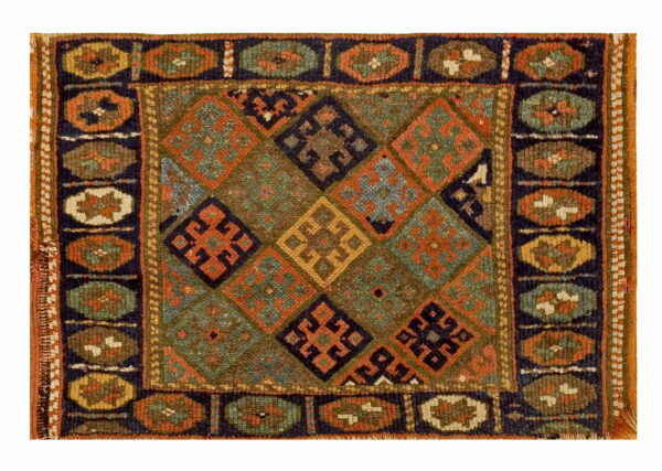 Square rug with a central diamond pattern in rust, green, brown, and navy, framed by an oval motif border.