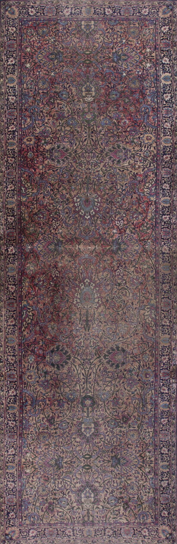 Low pile rug runner featuring an intricate traditional floral and vine pattern in dusty red, tan, and purple.