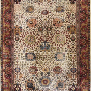 Rectangular rug with a cream field, dense floral and medallion pattern, bordered in deep red.