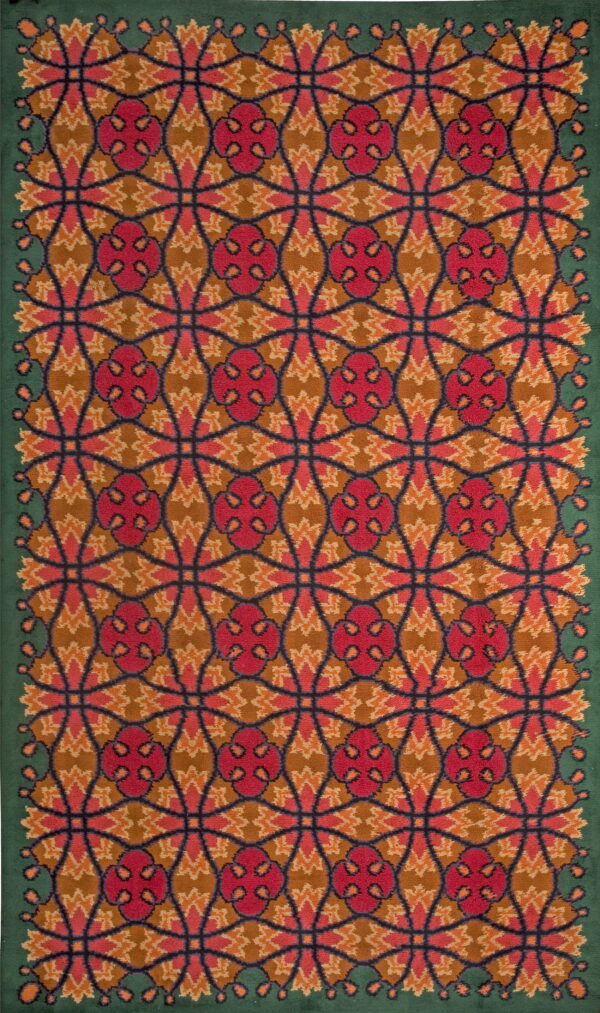 Rug with red, orange, and brown geometric motifs, detailed with a dark trellis and a solid green border.