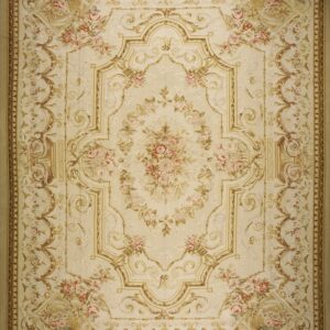 Cream rug featuring a large pink floral bouquet surrounded by elaborate tan and gold scrolling borders.