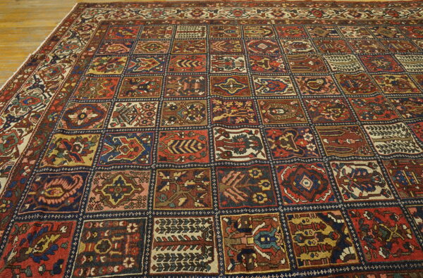Red, blue, and yellow squares create a repeating garden panel pattern on wood flooring.