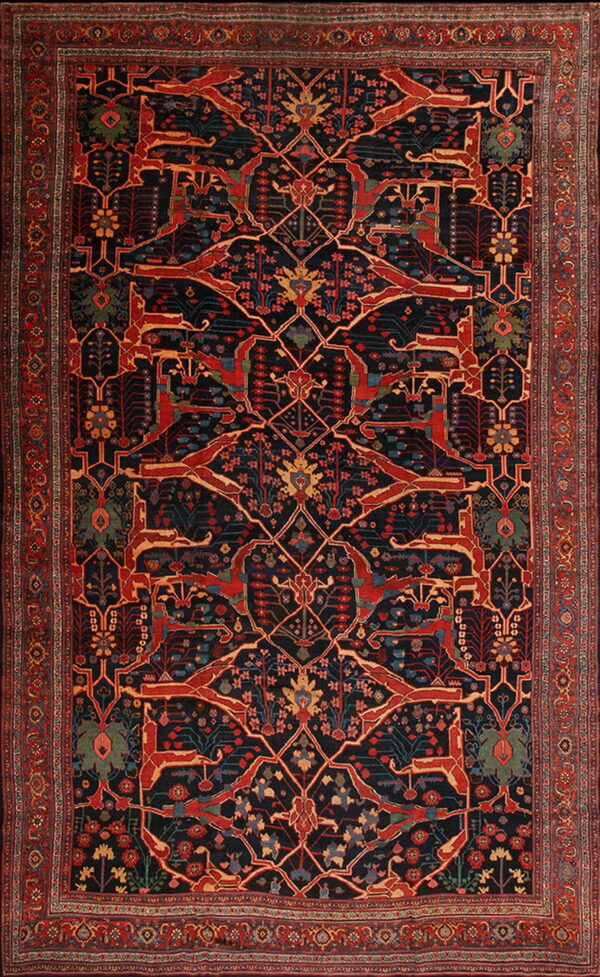 Rectangular rug featuring a dark blue field with a dense trellis pattern incorporating red stylized animal figures.