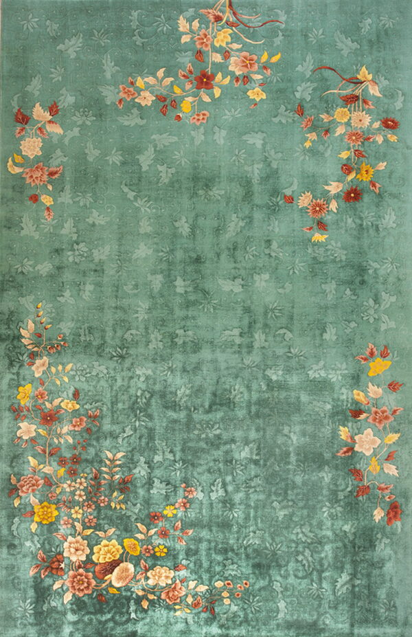 A distressed teal rug features colorful bouquets of red, peach, and yellow flowers clustered near the edges.