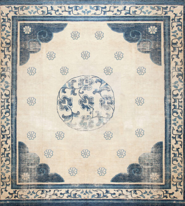 Elegant blue and cream floral rug
