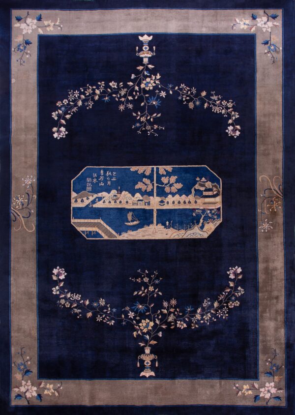 Elegant blue rug with floral patterns.