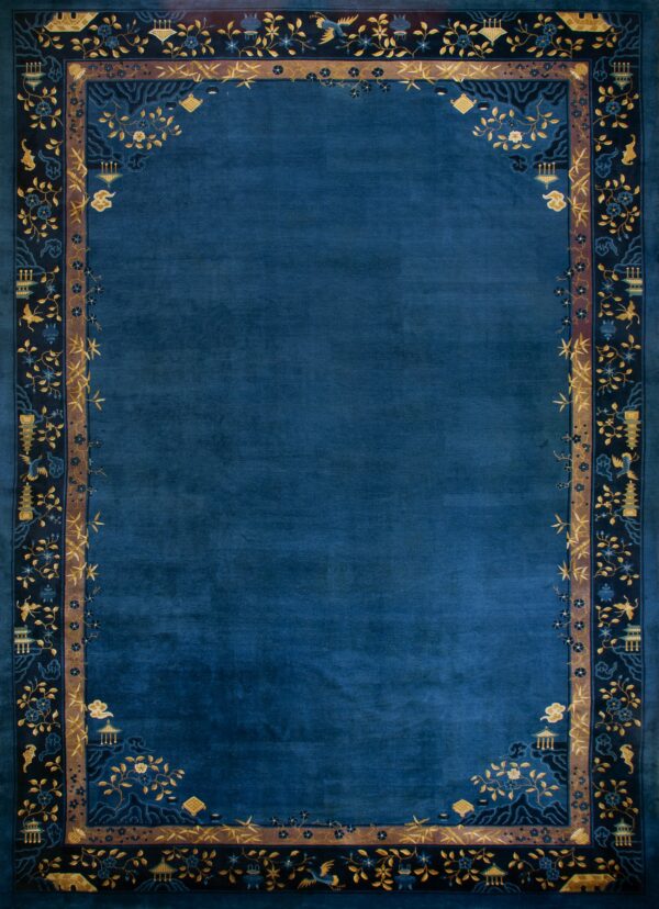 Elegant blue rug with floral border