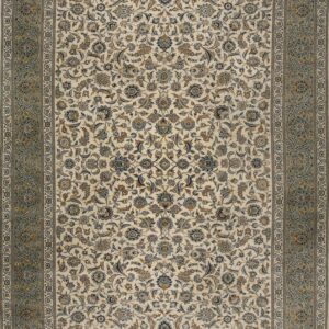 Cream rug featuring an all-over floral pattern and a wide sage green and ivory ornamental border.