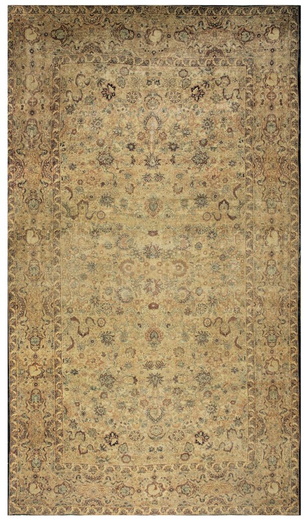 Detailed traditional rug featuring an all-over ornate floral pattern in muted beige, brown, and subtle colors.