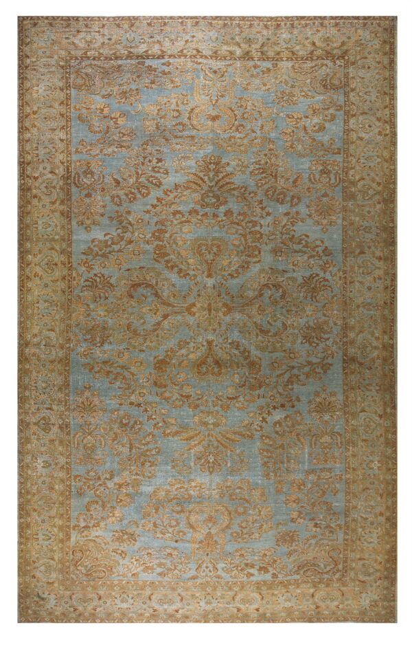 Distressed traditional rug featuring a light blue field and ornate copper-brown floral patterns.