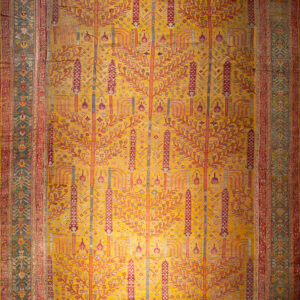 Vibrant floral-patterned antique wool rug