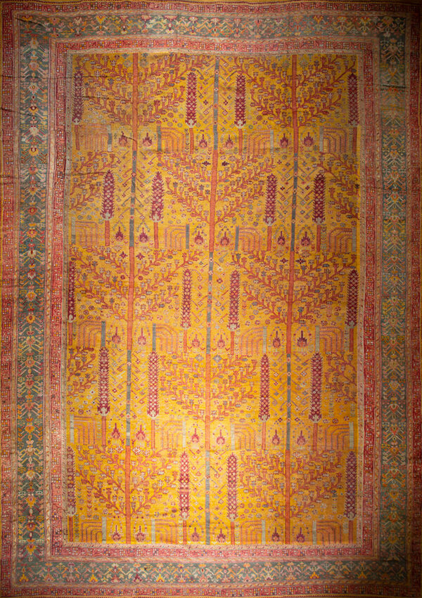 Vibrant floral-patterned antique wool rug
