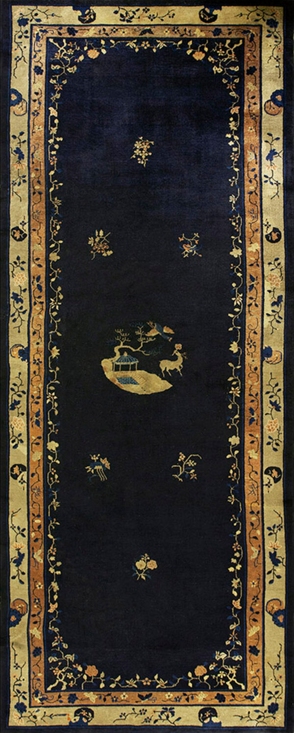 Navy runner rug featuring gold and tan borders, a central pavilion scene, and scattered floral elements.