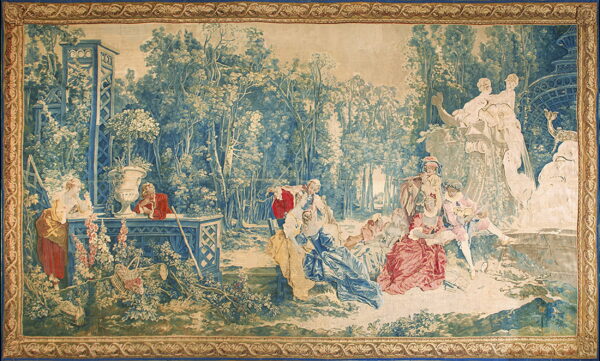 Detailed tapestry featuring a pastoral scene with figures in period dress and an ornamental border.