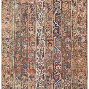 Rose, navy, and earth-toned striped rug featuring detailed botanical motifs and a multi-layered border.