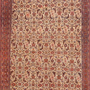 Long runner rug with a dense red, blue, and brown botanical pattern on an ivory field and a multi-layered border.