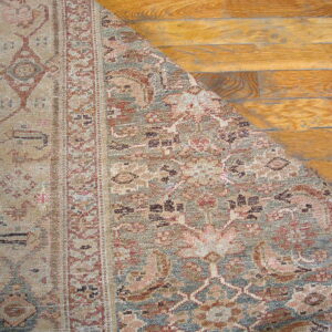 Intricate floral design on textured rug