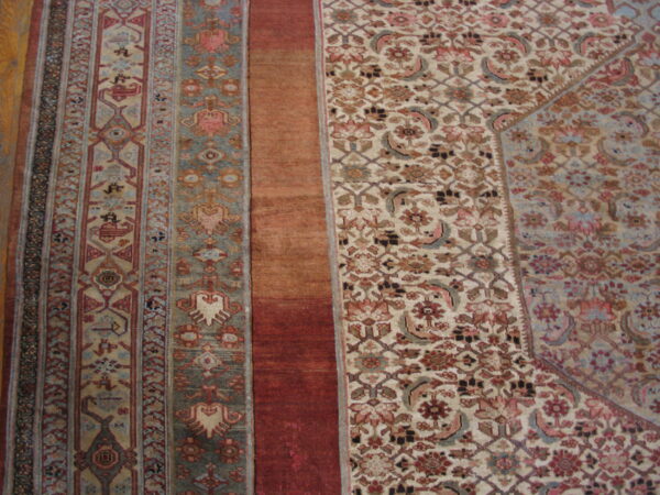 Intricate patterns on large wool rug