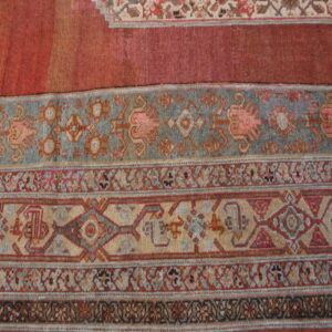Colorful antique wool rug design.
