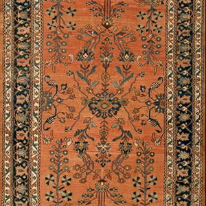 Terracotta runner rug with detailed blue, green, and tan floral motifs and a complex dark navy border.