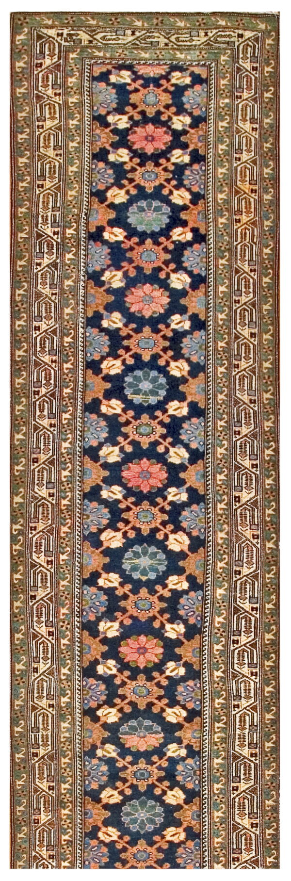Navy blue runner rug with repeating floral medallions in pink and teal, surrounded by complex geometric borders.