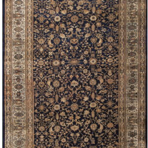 Traditional navy and tan rug with an intricate all-over floral design and wide decorative borders.